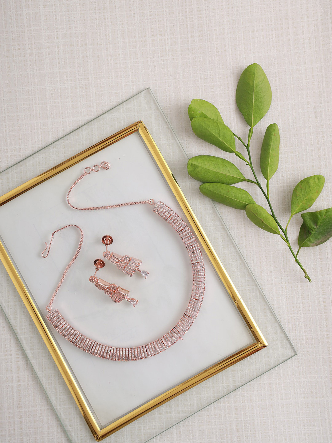 

Jazz and Sizzle Rose Gold-Plated AD & CZ Studded Jewellery Set