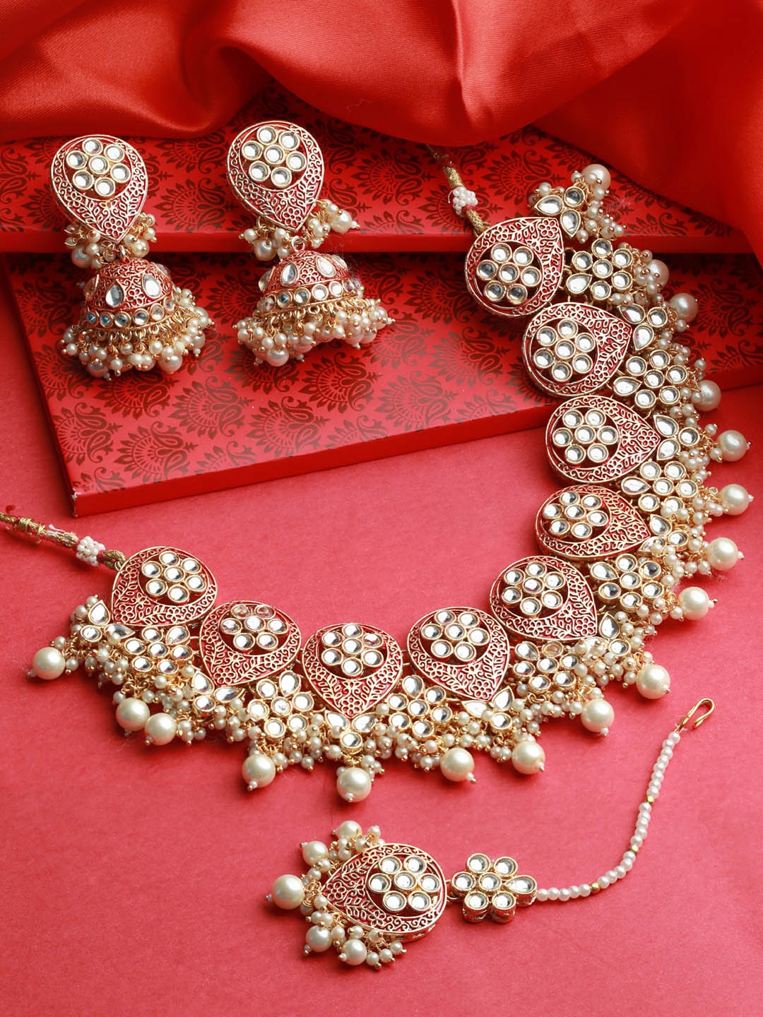 

Jazz and Sizzle Gold-Plated Maroon & White Kundan-Studded Jewellery Set