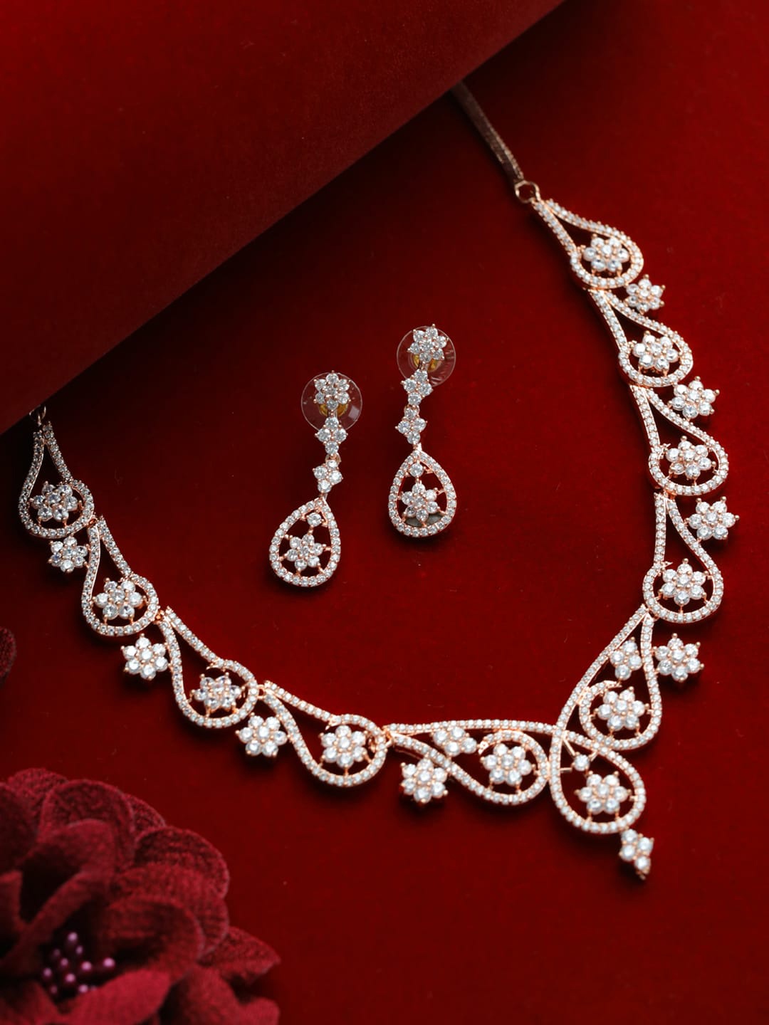 

Jazz and Sizzle Rose Gold-Plated White AD Stone Studded Jewellery Set