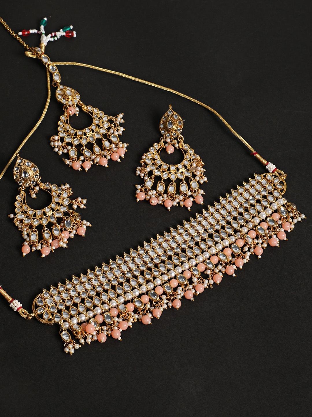 

Jazz and Sizzle Peach & White Gold-Plated Kundan Studded & Beaded Jewellery Set