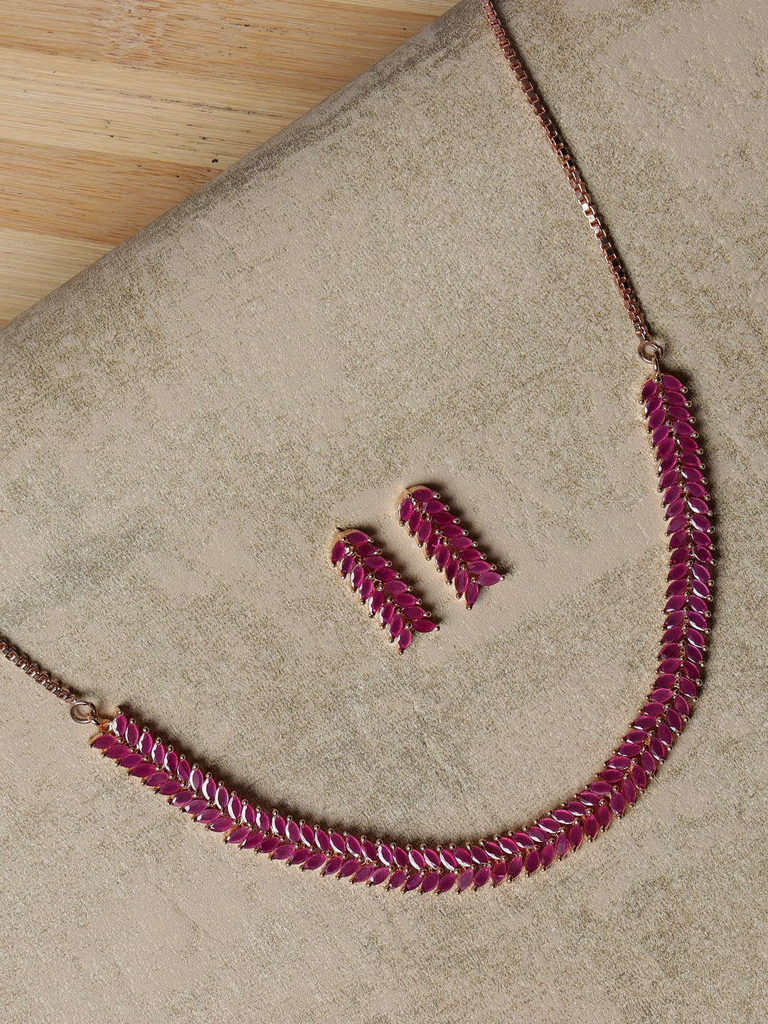 

Jazz and Sizzle Gold-Plated Magenta AD-Studded Jewellery Set