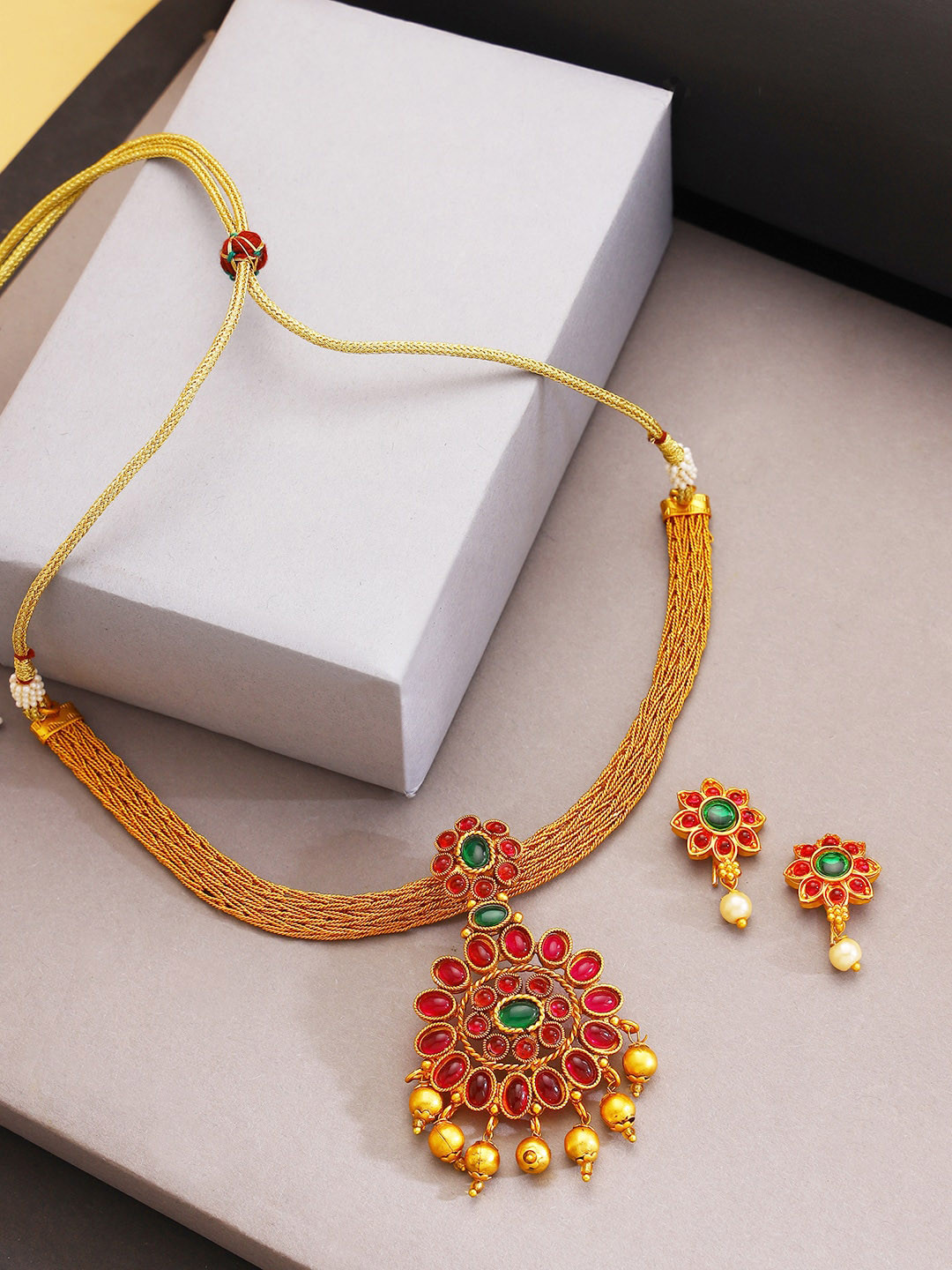 

Jazz and Sizzle Gold-Plated Pink & Green Stone Studded Jewellery Set
