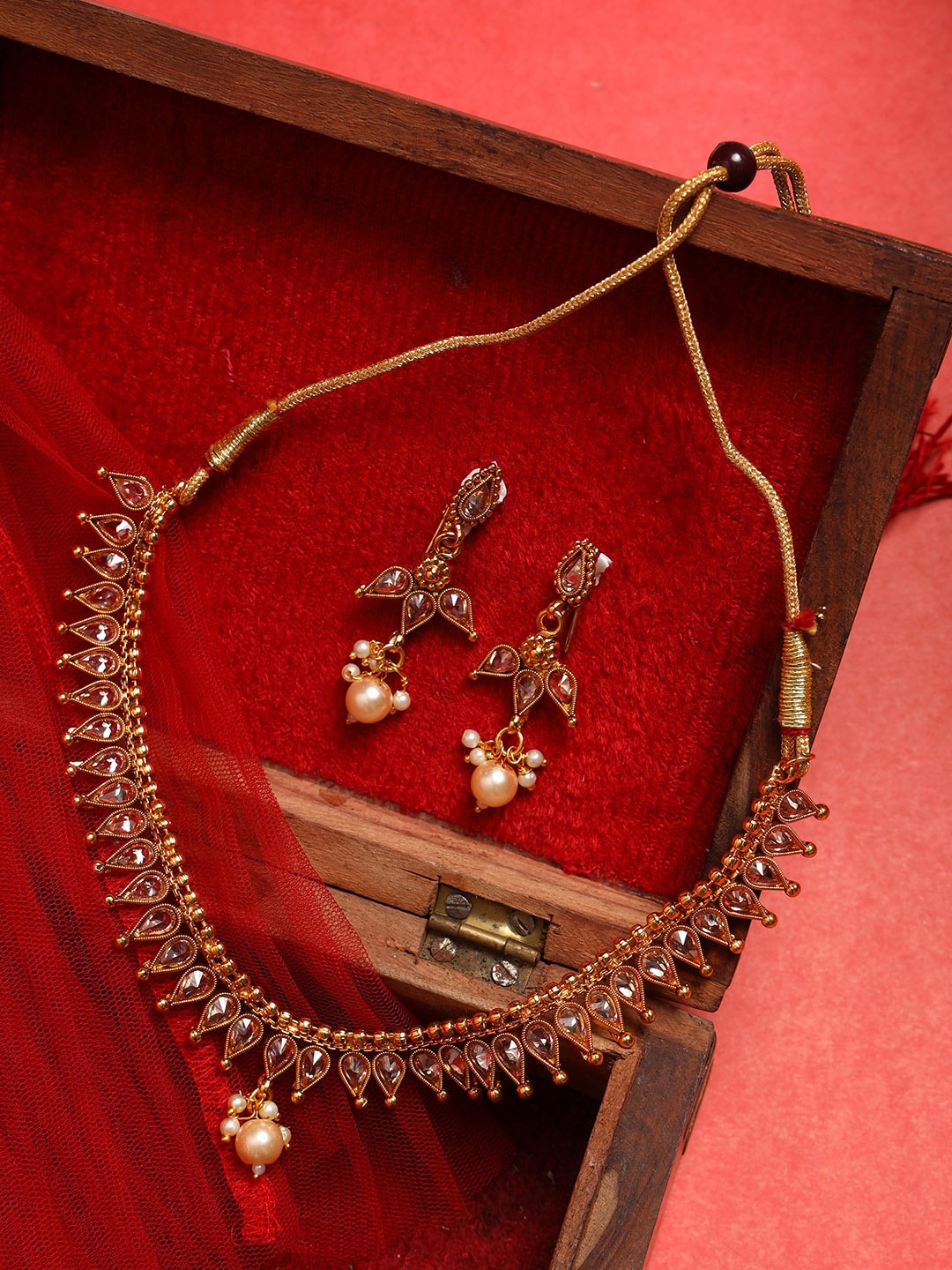 

Jazz and Sizzle Gold-Plated Kundan Studded Jewellery Set