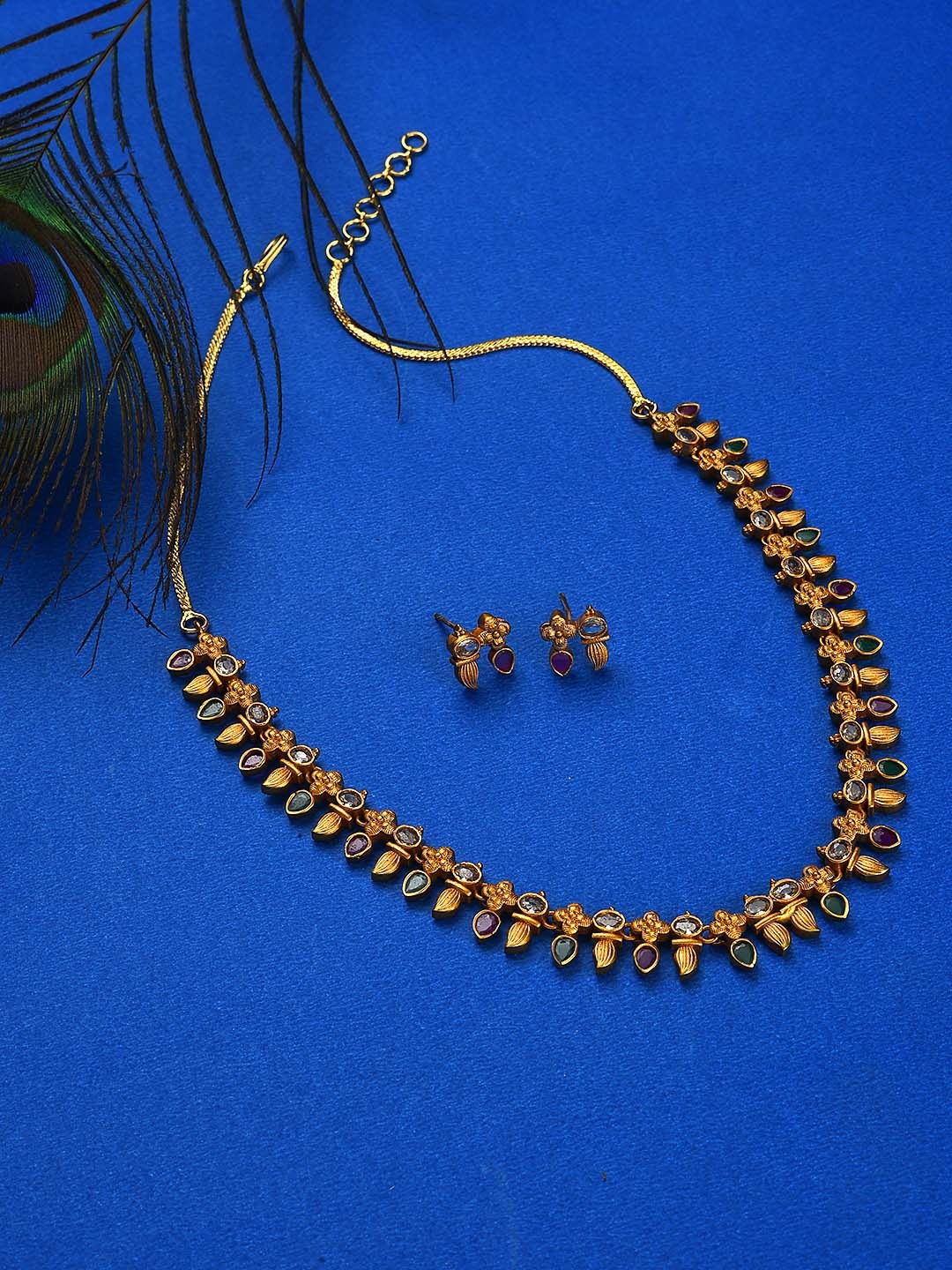 

Jazz and Sizzle Gold-Plated Pink AD Studded Jewellery Set