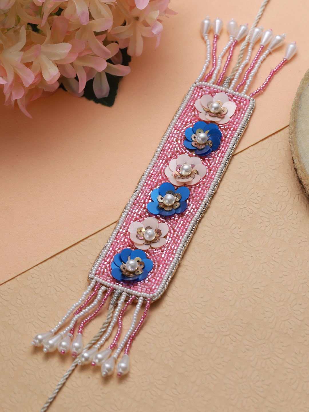 

Jazz and Sizzle Women Pink & Blue Wraparound Bracelet