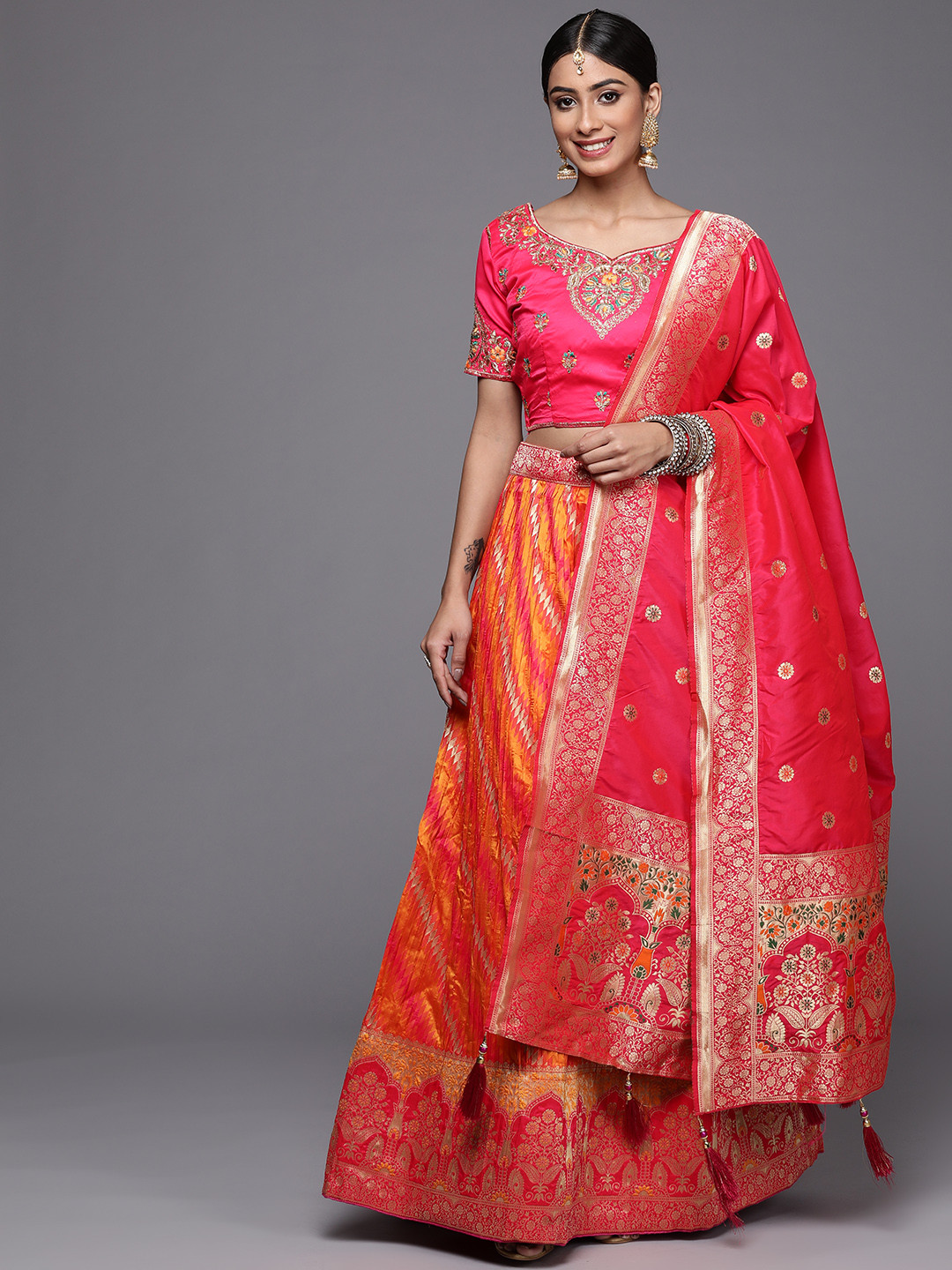 

Mitera Orange & Pink Semi-Stitched Lehenga & Unstitched Blouse With Dupatta
