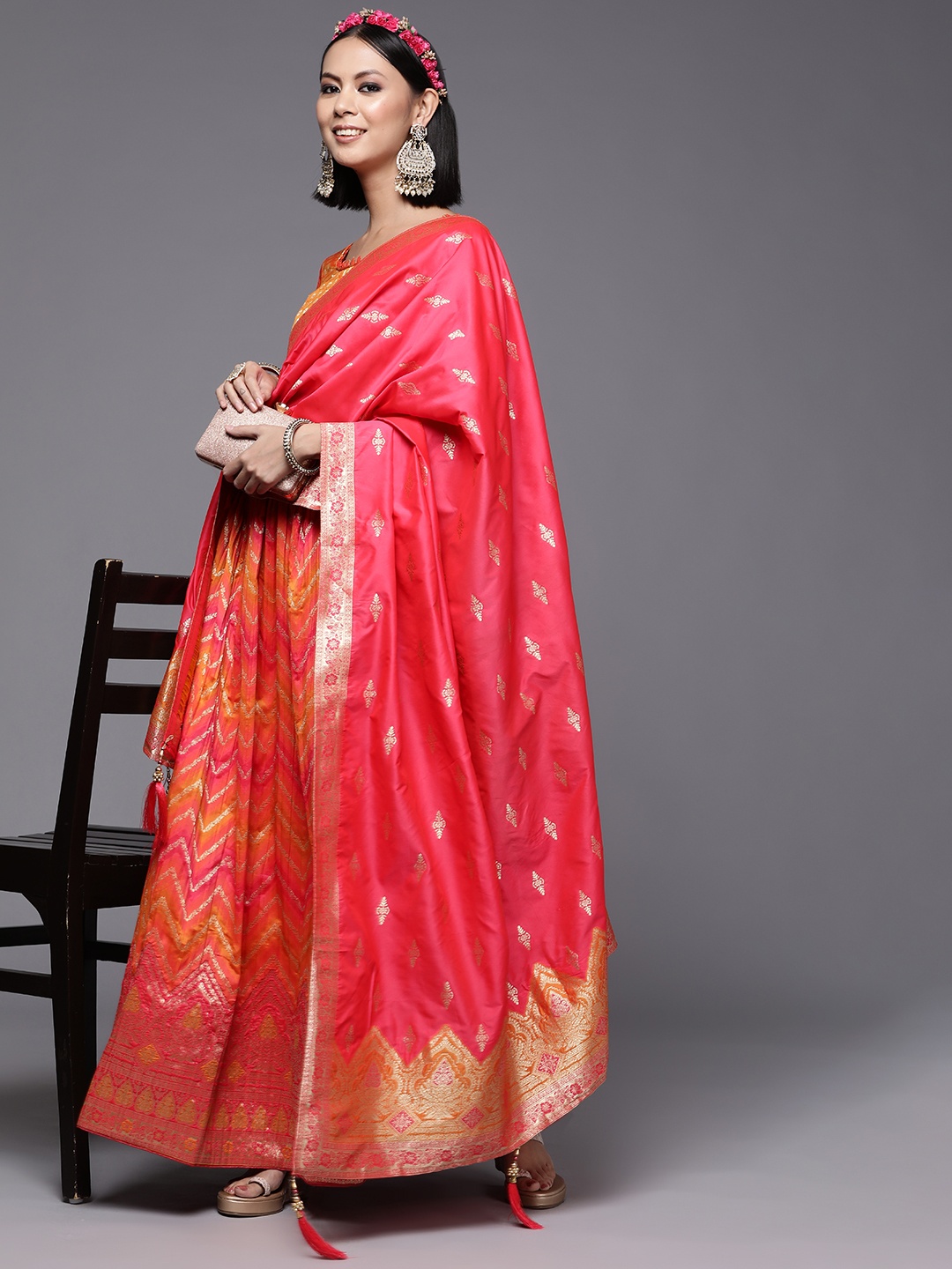 

Mitera Orange & Pink Semi-Stitched Lehenga & Unstitched Blouse With Dupatta