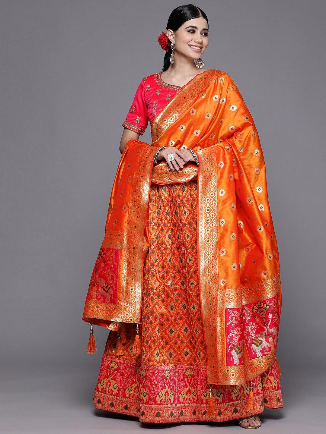 

Mitera Orange & Pink Semi-Stitched Lehenga & Unstitched Blouse With Dupatta