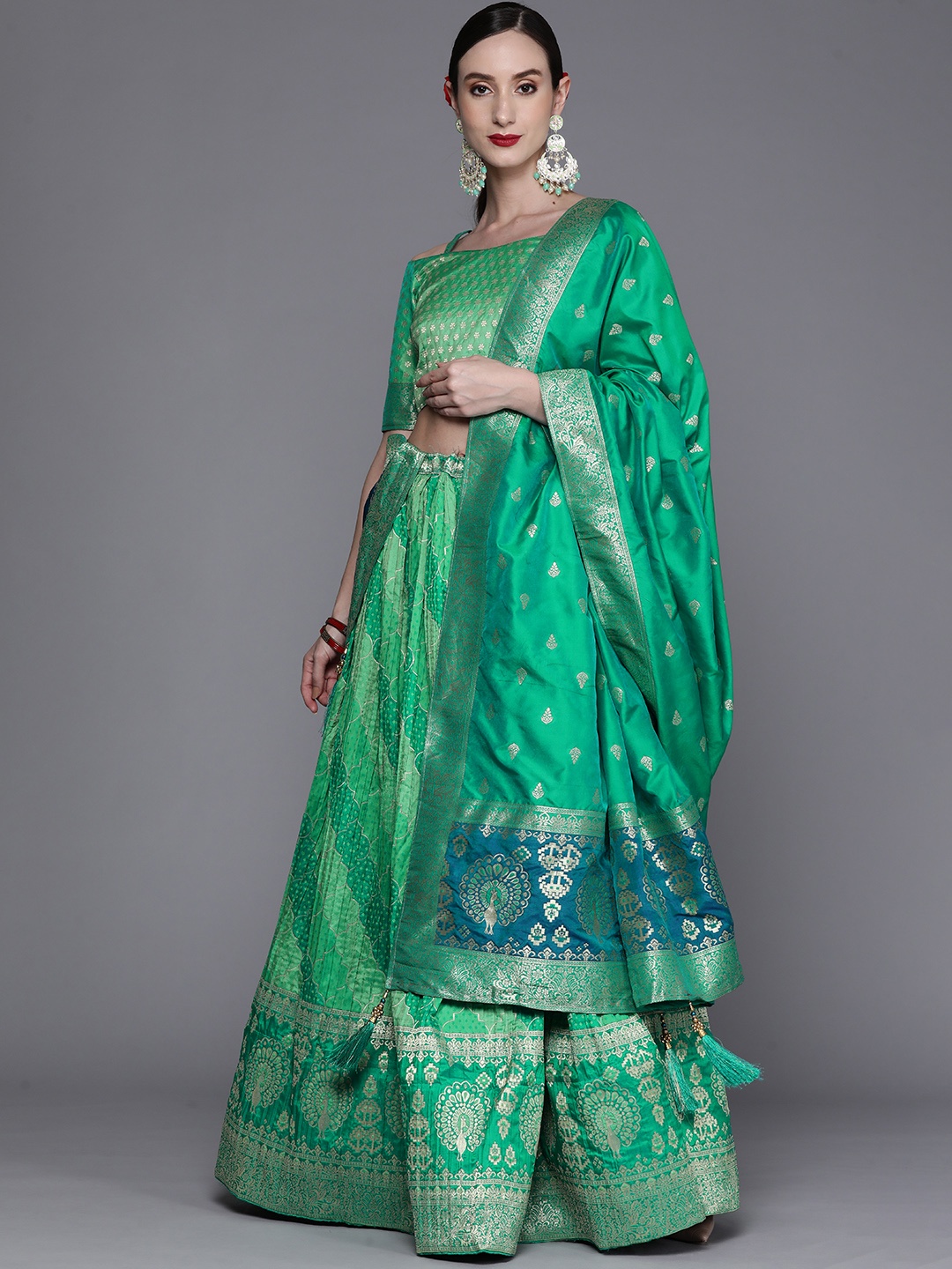 

Mitera Green & Golden Semi-Stitched Lehenga & Unstitched Blouse With Dupatta