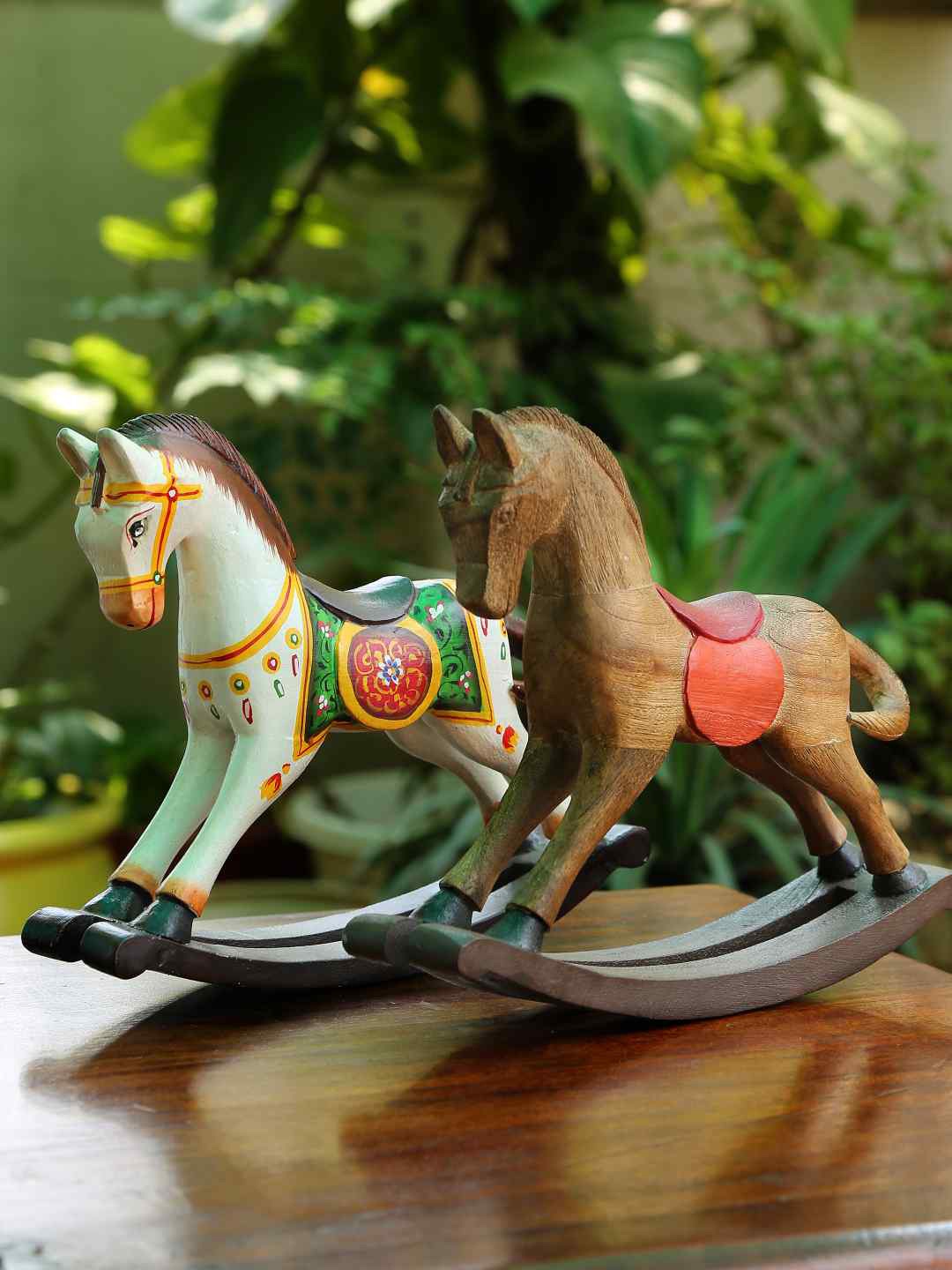 

Amoliconcepts White & Multicolor Wooden Rocking Horse Table Showpiece