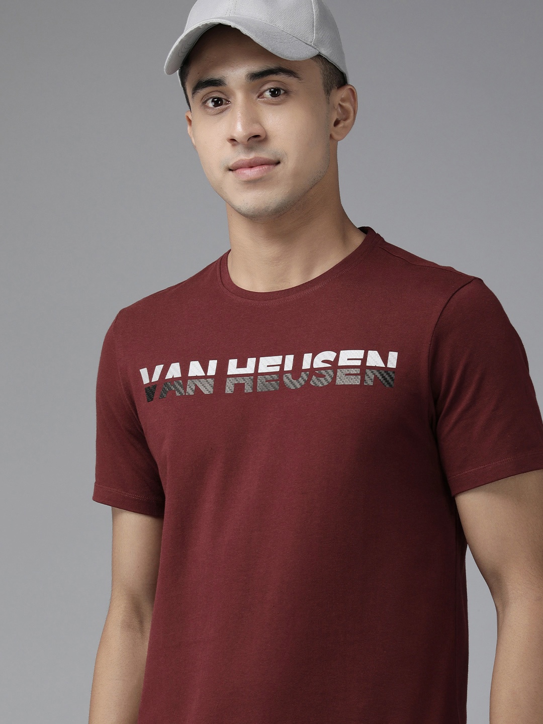 

Van Heusen Flex Men Maroon Brand Logo Printed Slim Fit Sports T-shirt