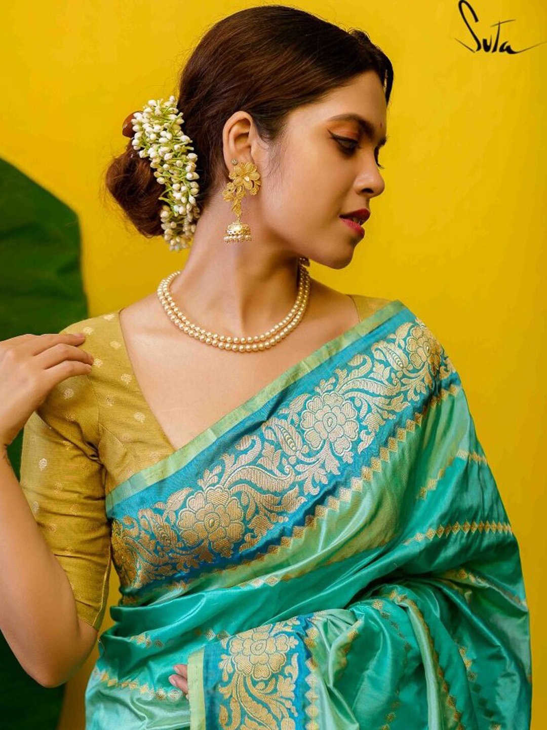 

Suta Yellow Woven Design Muga Silk Saree Blouse