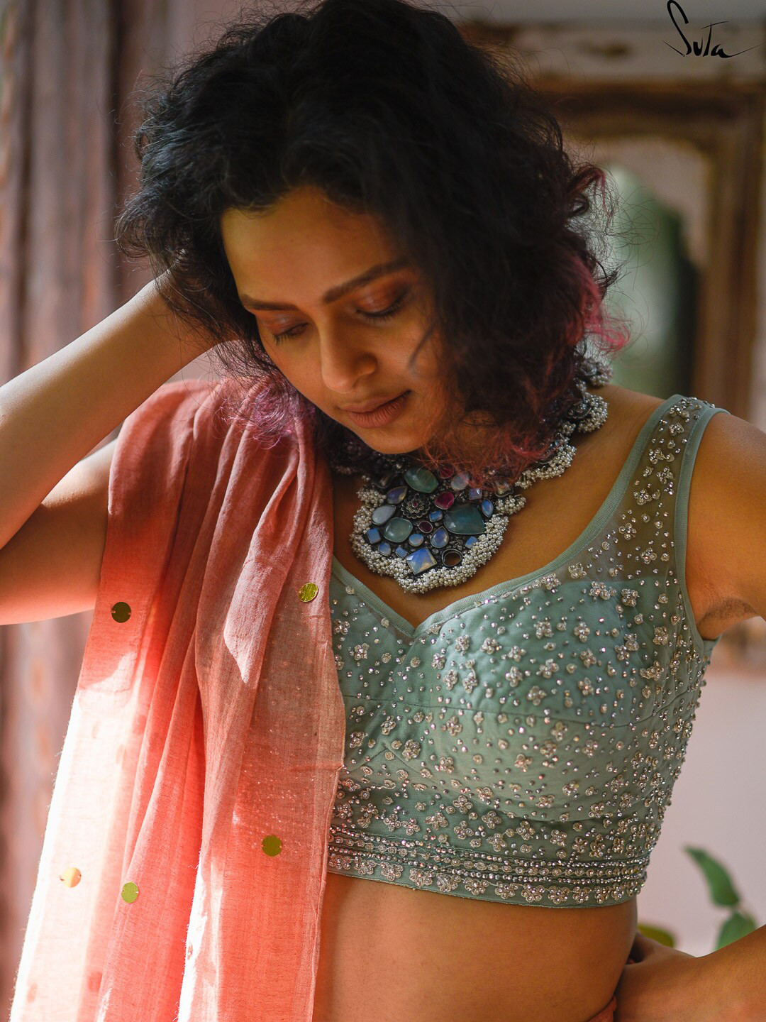 

Suta Teal Embellished Saree Blouse