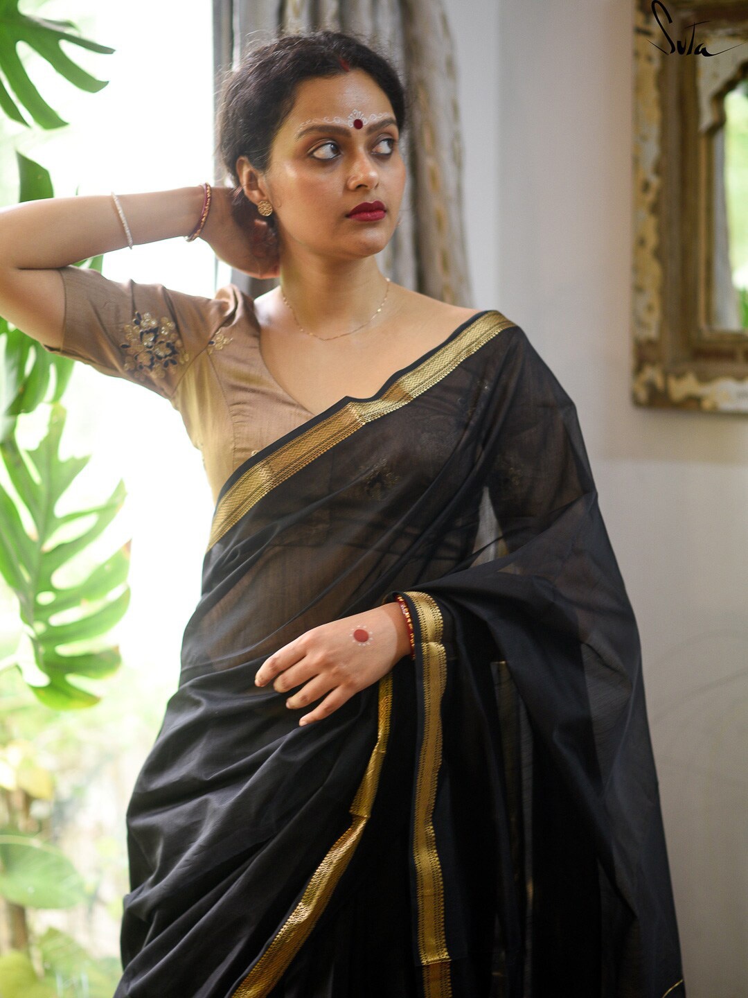 

Suta Gold-Toned Embroidered Saree Blouse
