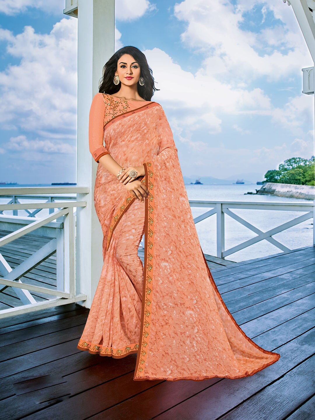 

Shaily Peach-Coloured & White Embroidered Pure Georgette Saree