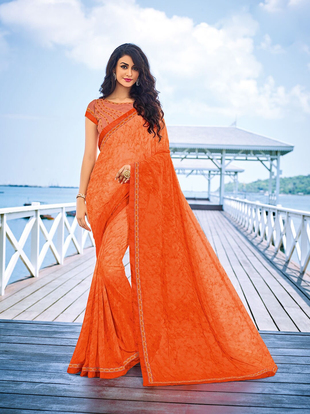 

Shaily Orange & White Pure Georgette Saree