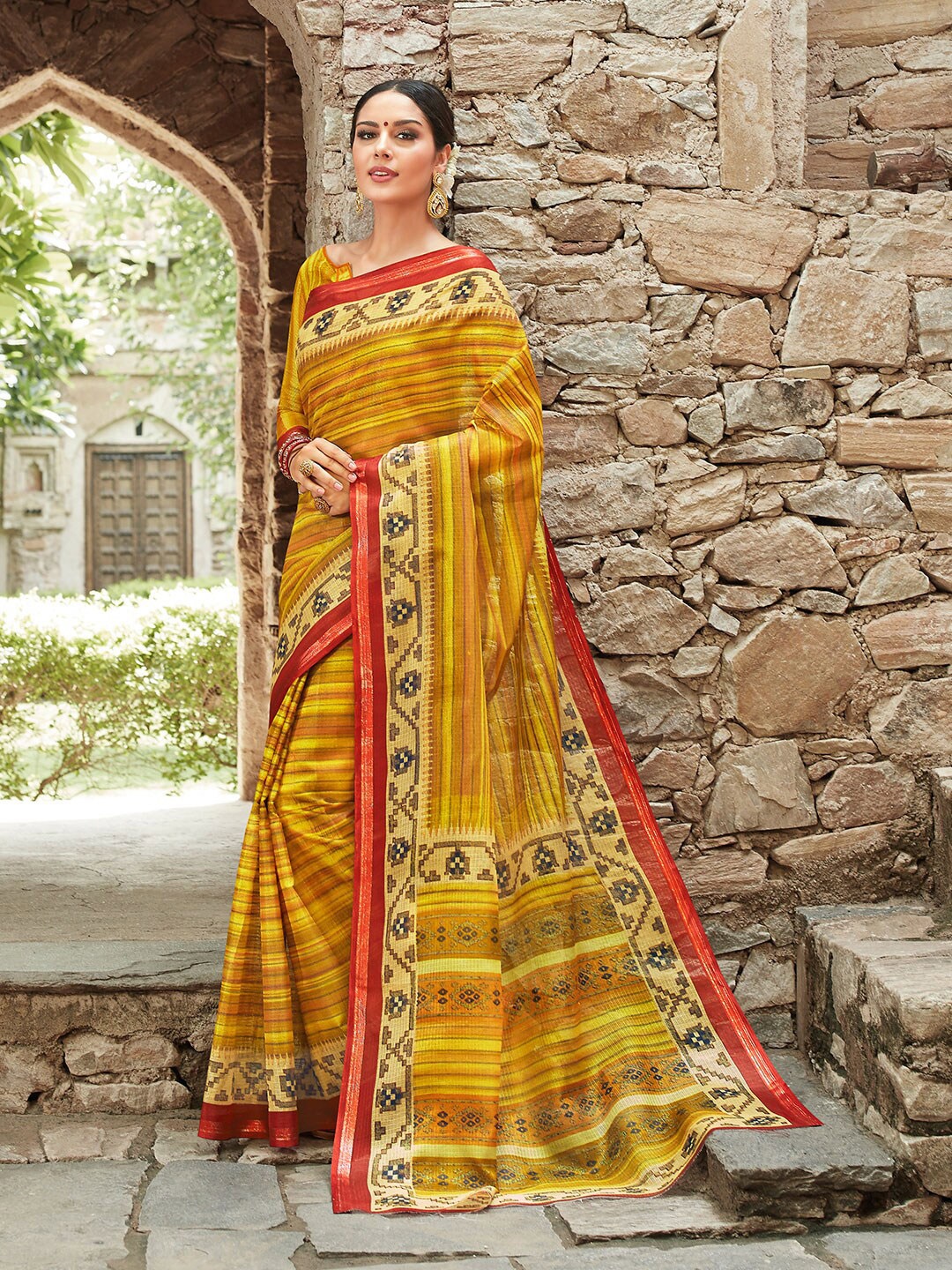 

Shaily Mustard & Red Ethnic Motifs Zari Silk Cotton Saree