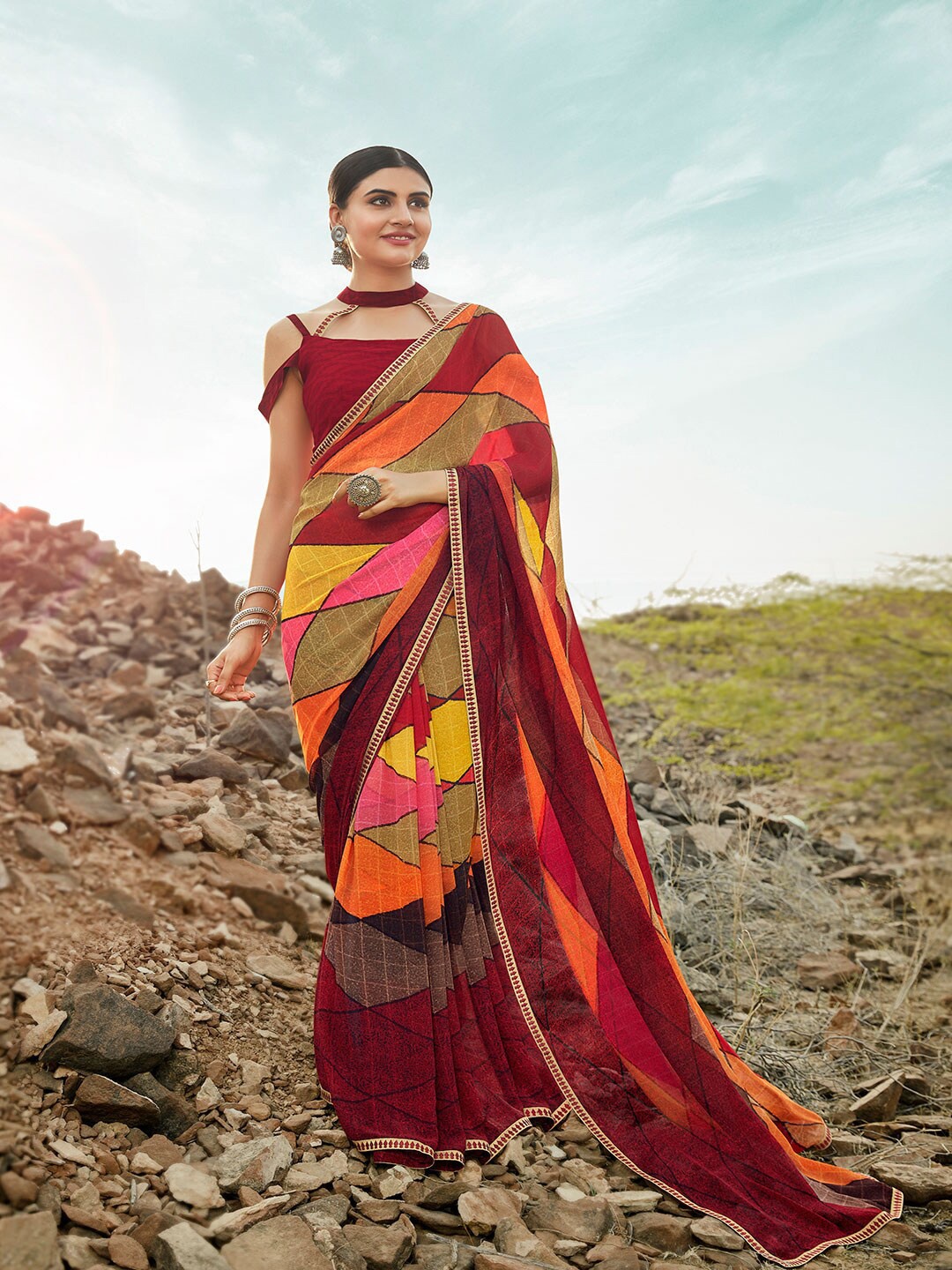 

Shaily Red & Yellow Printed Pure Georgette Saree