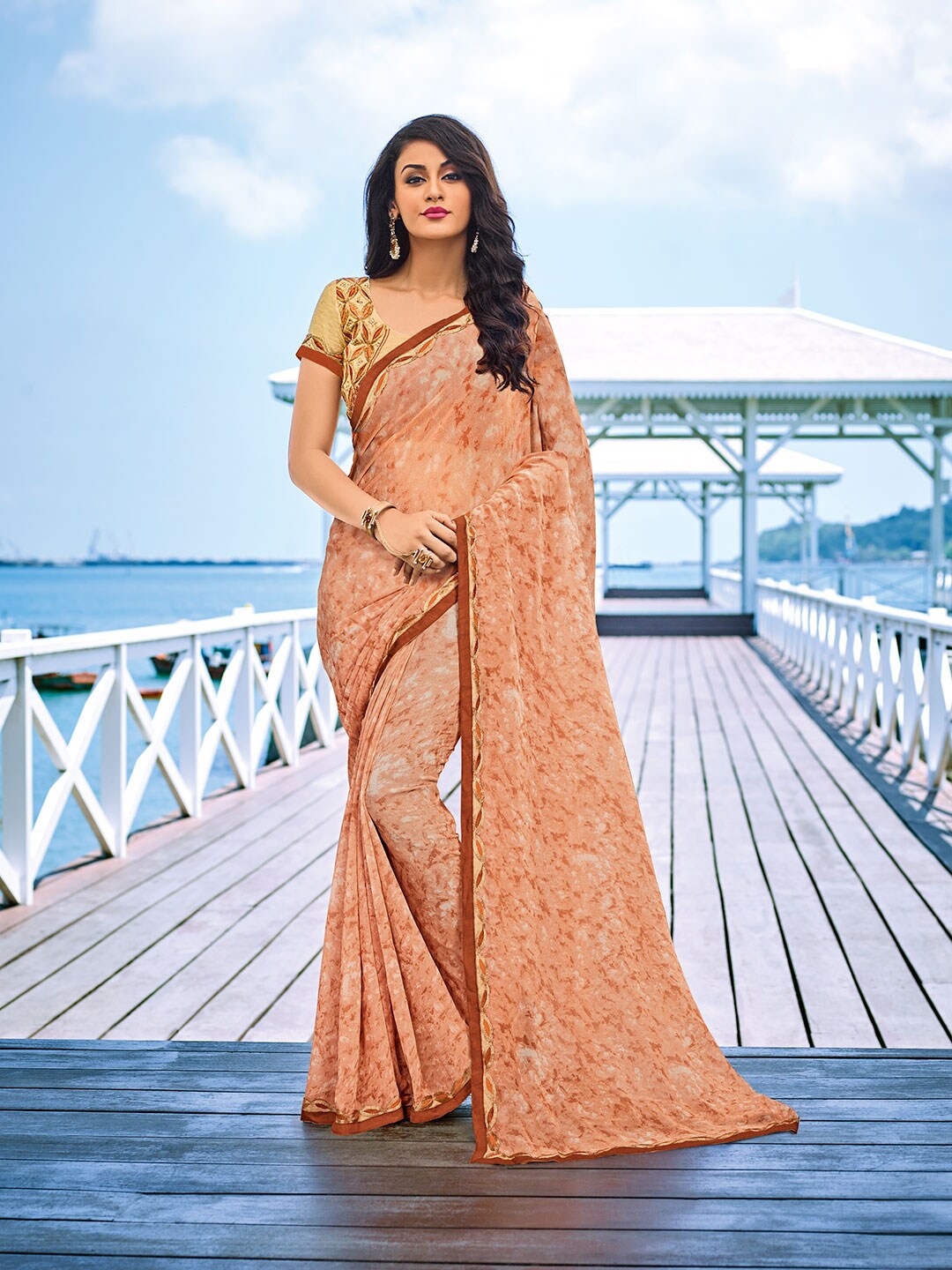 

Shaily Brown Tie and Dye Embroidered Pure Georgette Saree