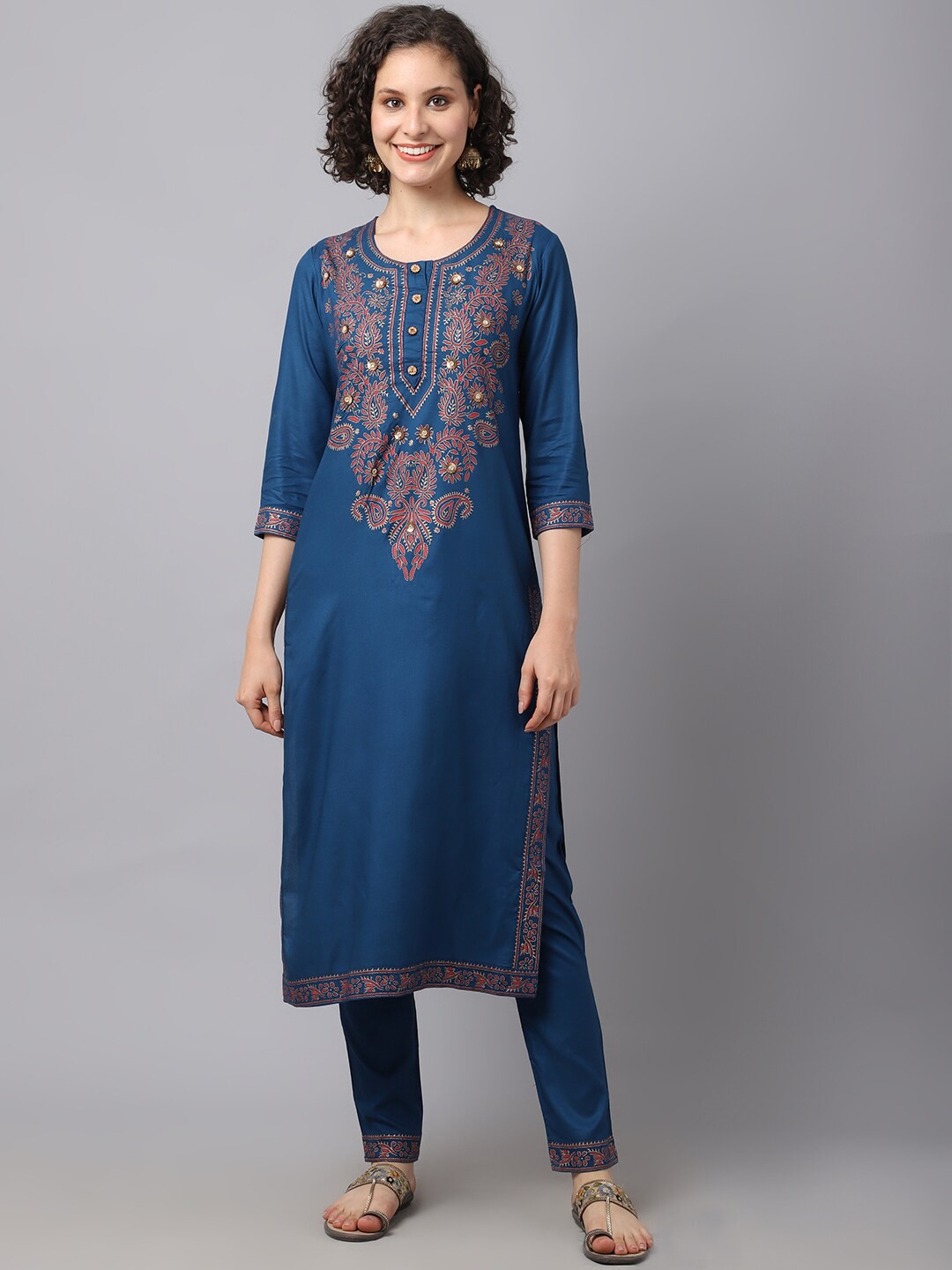 

Tulsattva Women Teal Blue Embroidered Kurta with Trousers