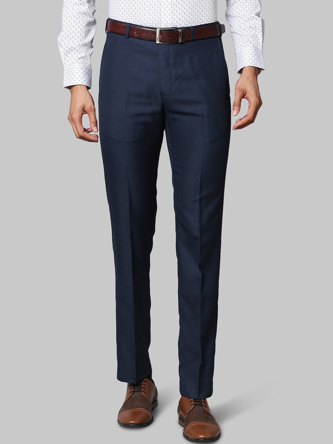 

Raymond Men Blue Solid Trousers