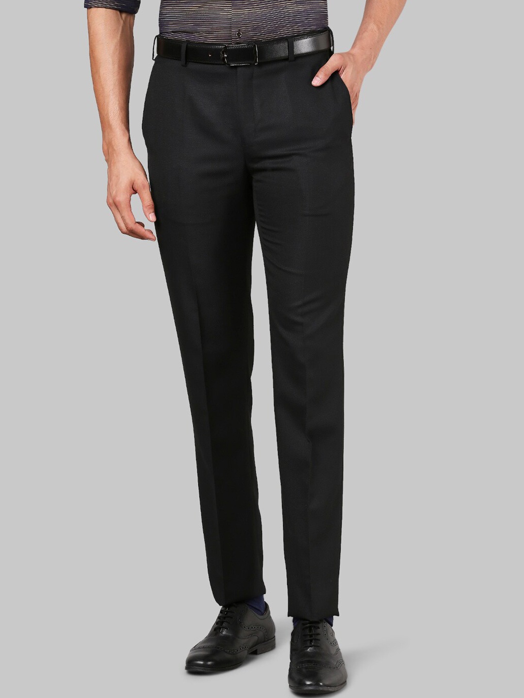 

Raymond Men Black Solid Formal Trousers