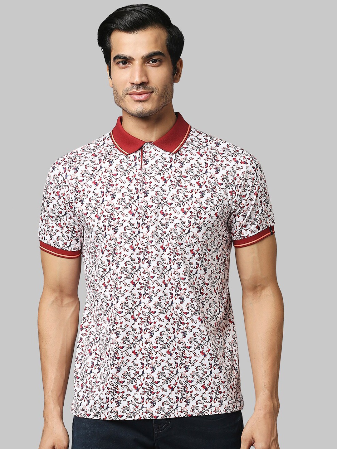 

Raymond Men Maroon & White Floral Printed Polo Collar Cotton T-shirt
