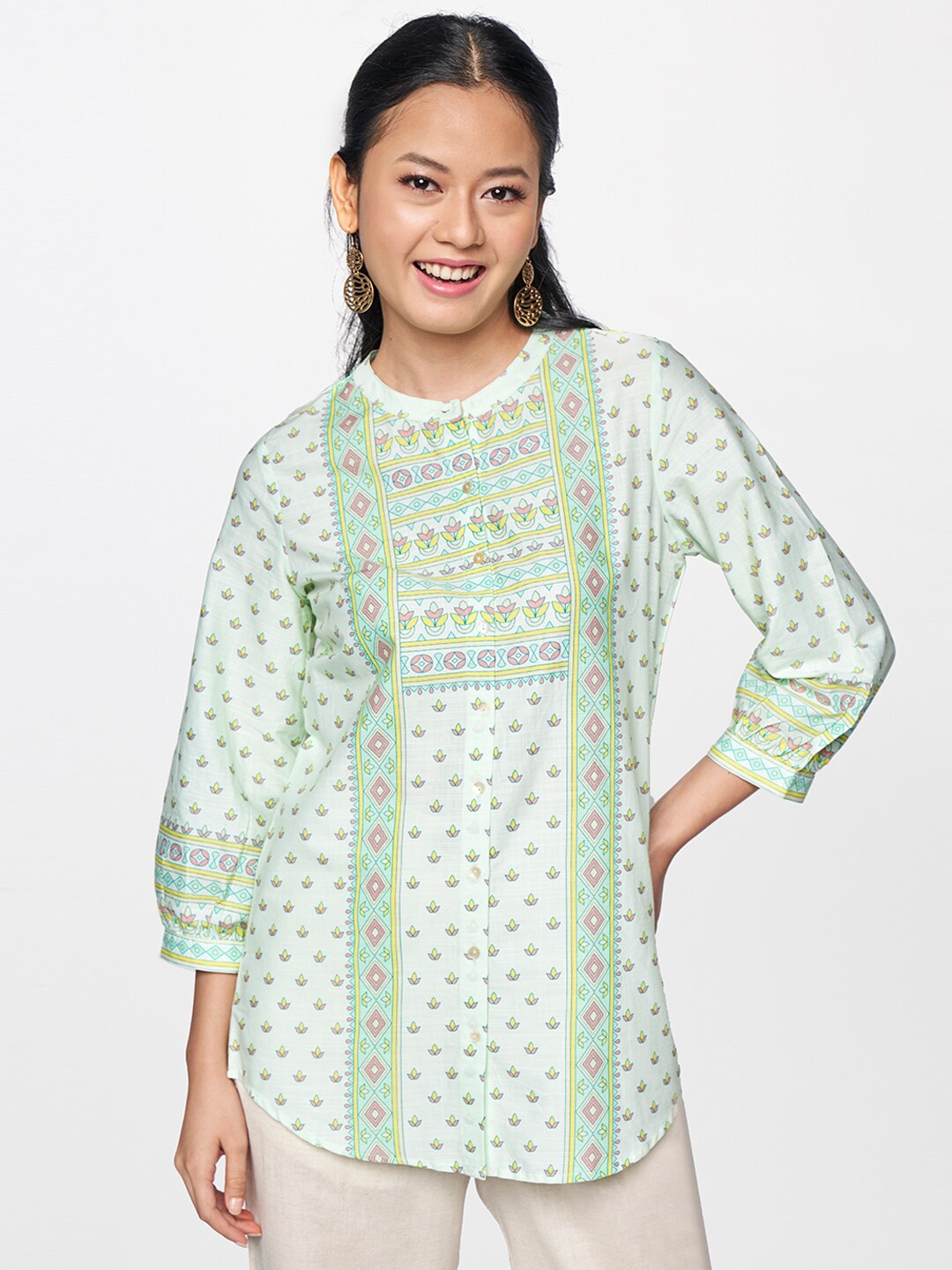 

Global Desi Women Green & Pink Printed Tunic