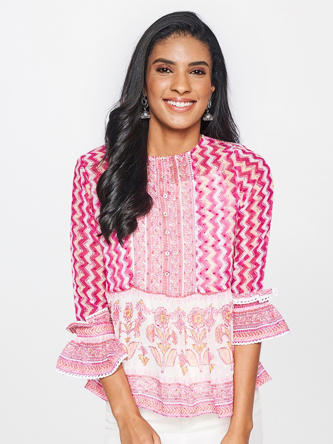 

Global Desi Women Pink Print Peplum Top