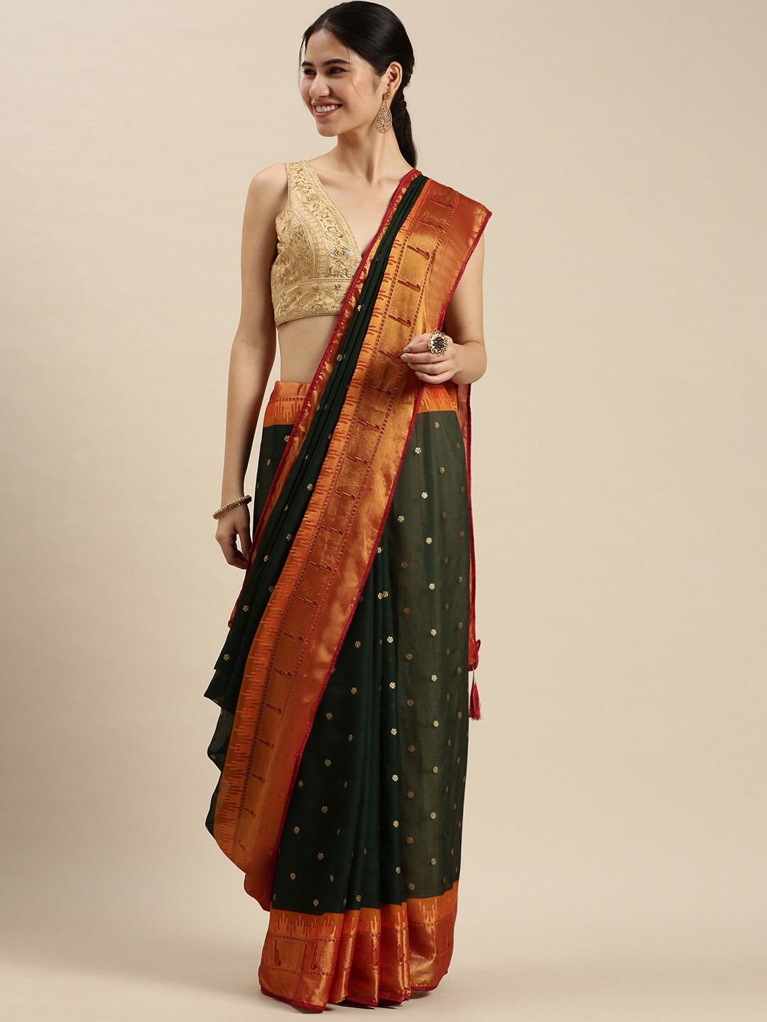 

Ethnic Threads Green & Gold-Toned Woven Design Zari Brasso Saree