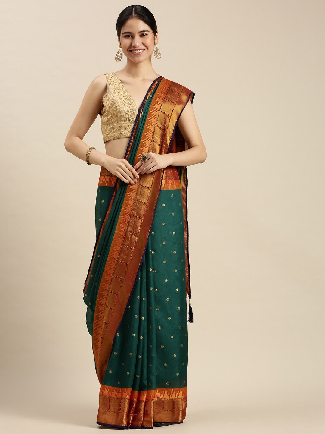 

Ethnic Threads Green & Gold-Toned Woven Design Zari Brasso Saree