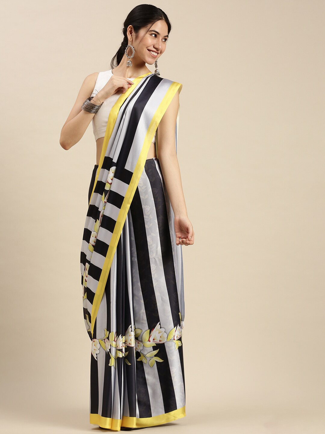 

Ethnic Threads Black & White Striped Printed Satin Saree