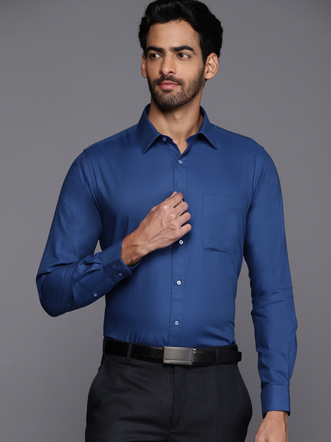 

Raymond Men Blue Pure Cotton Solid Slim Fit Formal Shirt