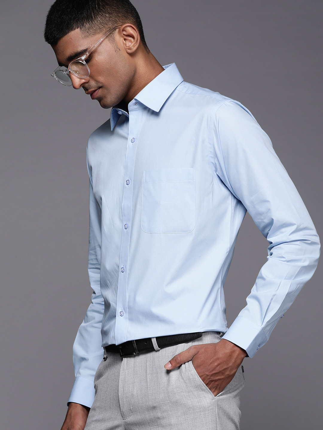 

Raymond Men Blue Pure Cotton Solid Slim Fit Formal Shirt