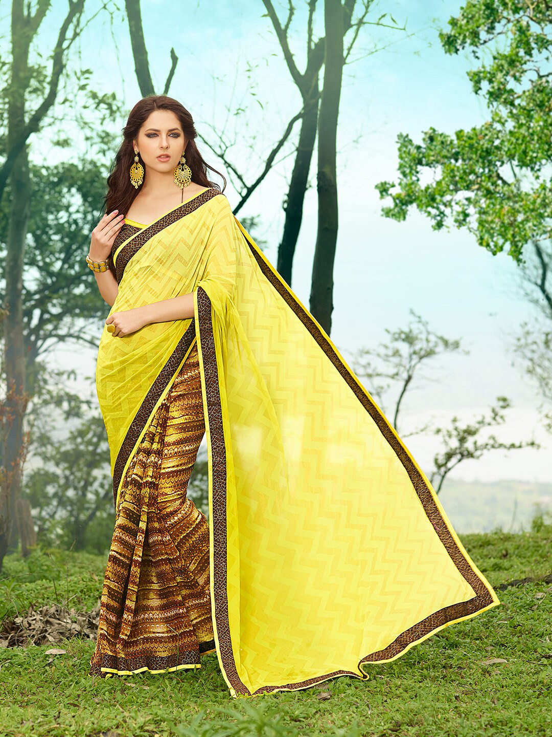 

Shaily Yellow & Brown Ethnic Motifs Pure Georgette Saree