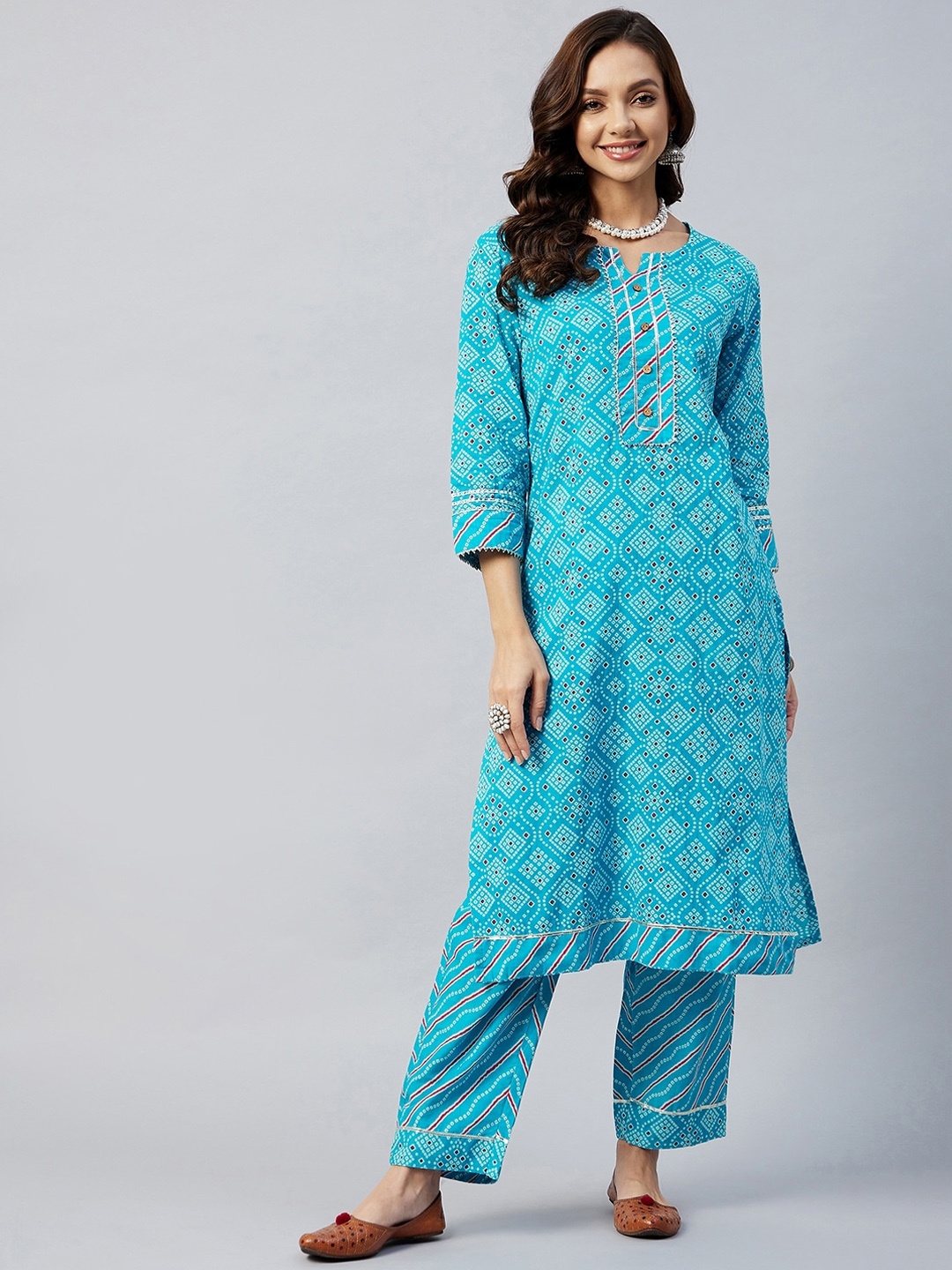 

InWeave Women Blue Printed Pure Cotton Kurta with Trousers