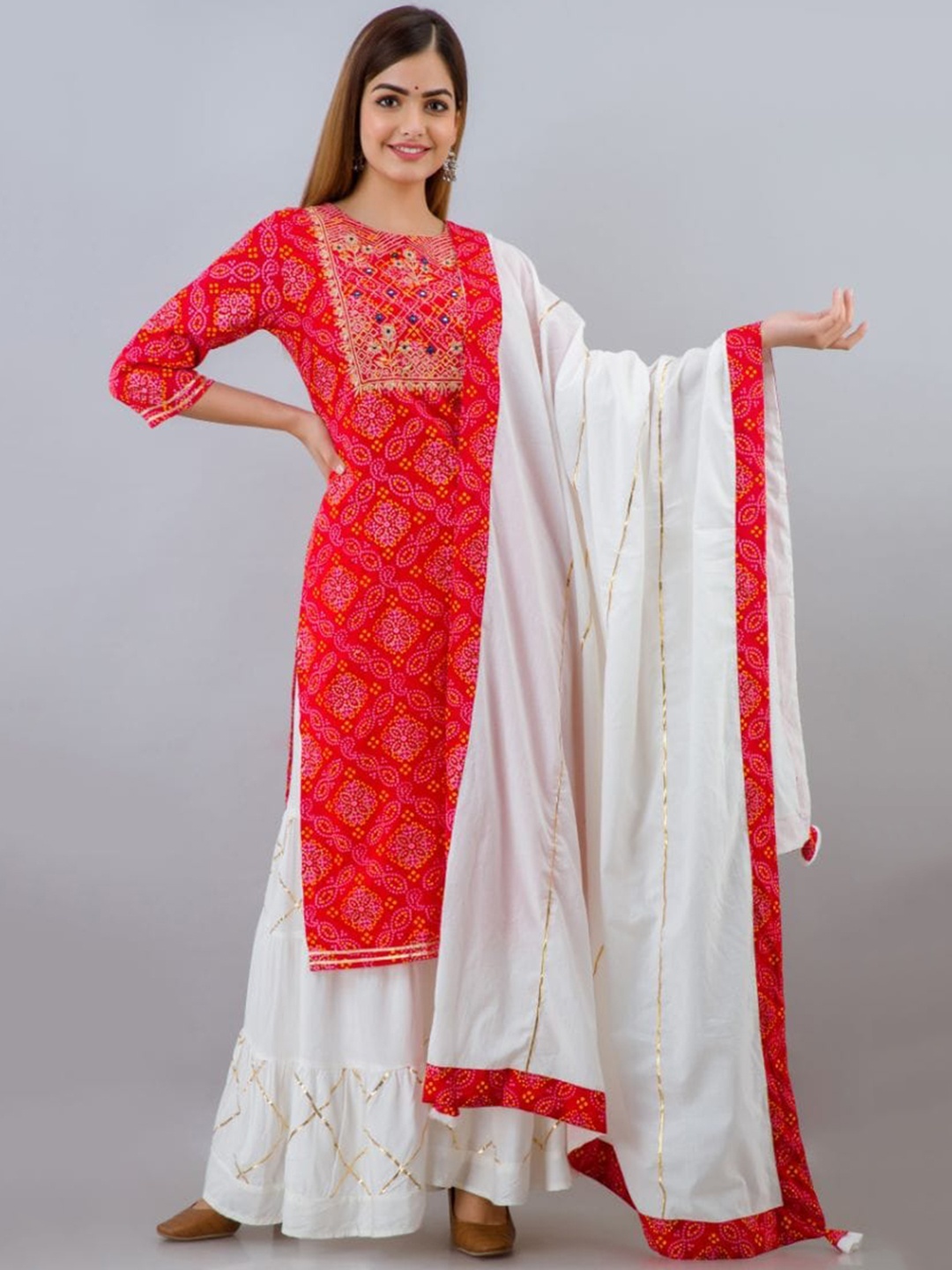 

Lovista Women Red Bandhani Printed Kurti with Sharara & With Dupatta