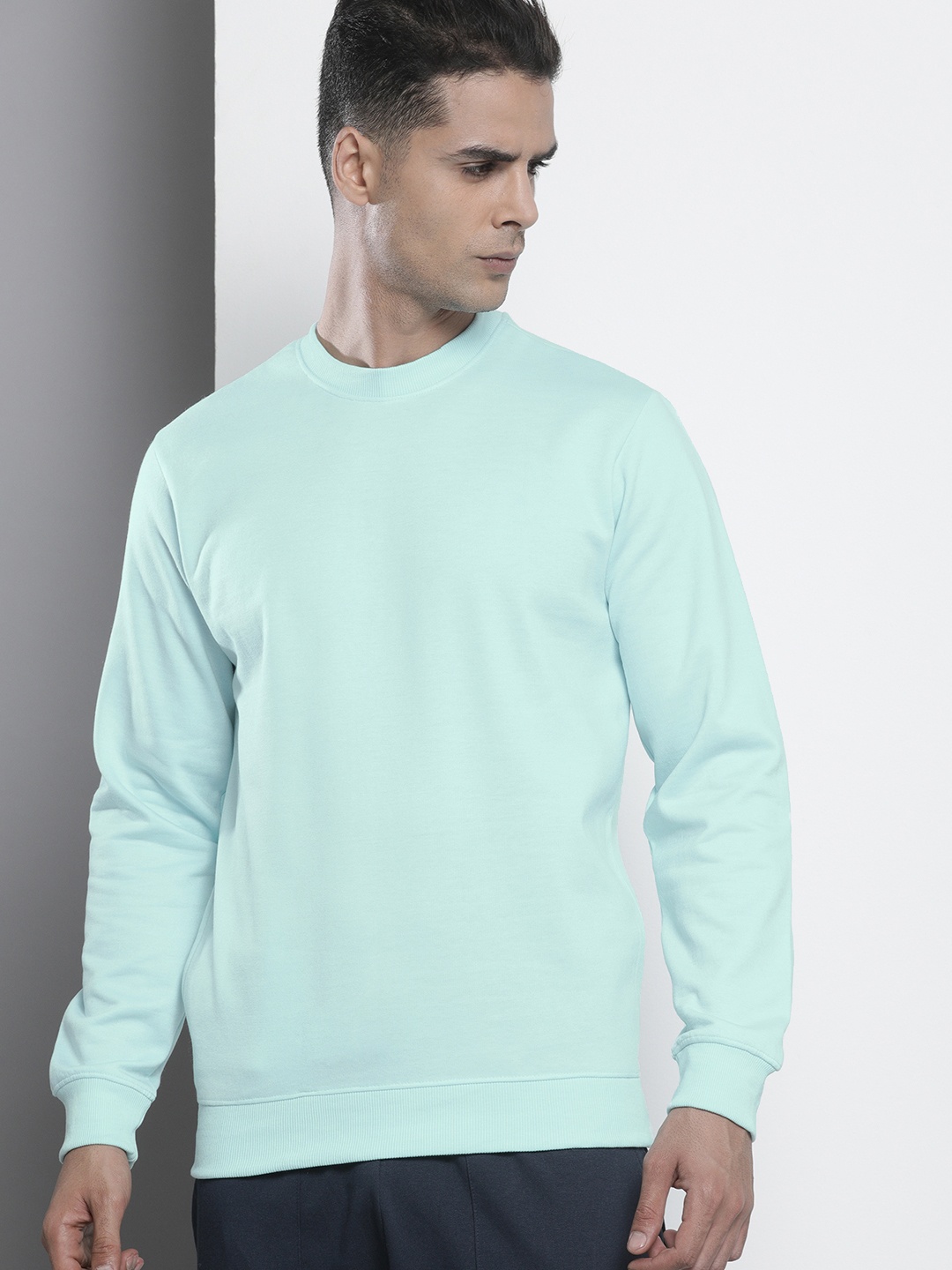 

The Indian Garage Co Men Blue Solid Sweatshirt