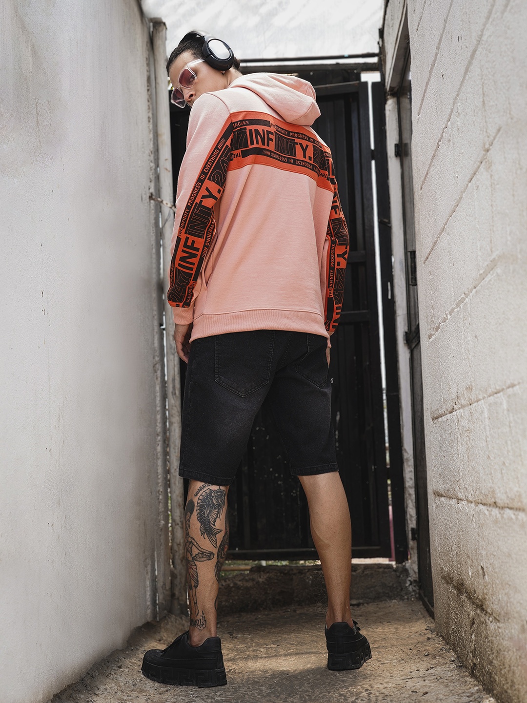 

The Indian Garage Co Men Peach-Coloured Printed Hooded Sweatshirt