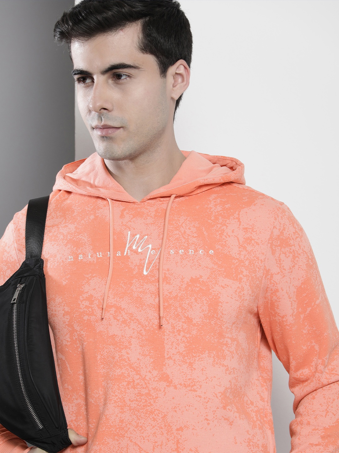 

The Indian Garage Co Men Peach-Coloured Printed Hooded Sweatshirt