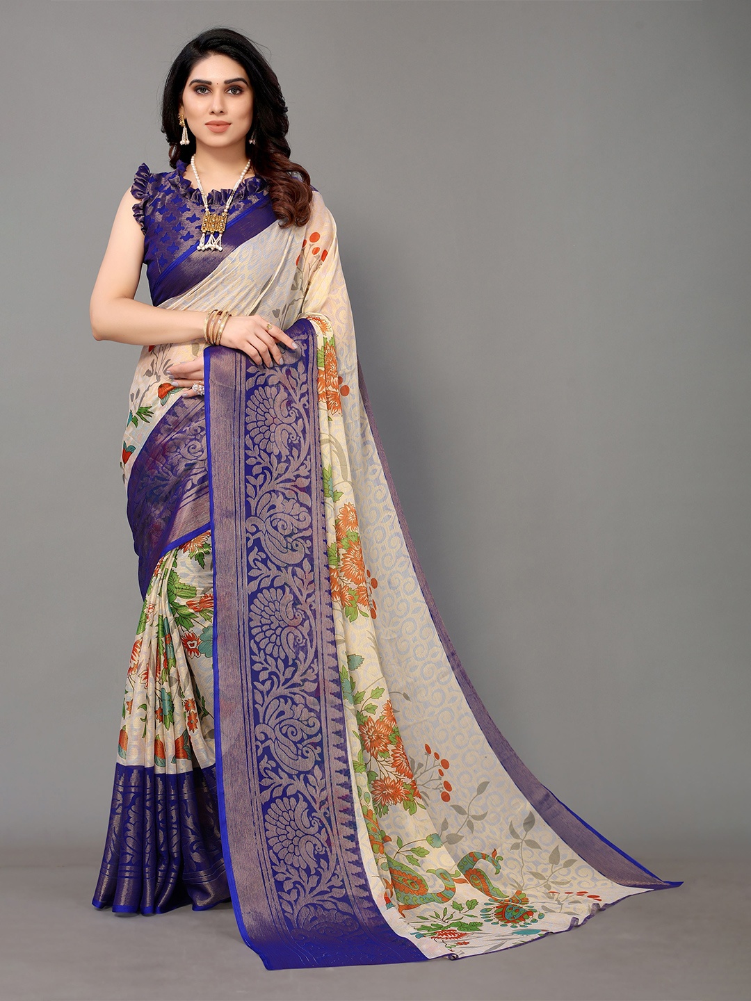 

Winza Designer Turquoise Blue & Gold-Toned Floral Zari Brasso Venkatgiri Saree