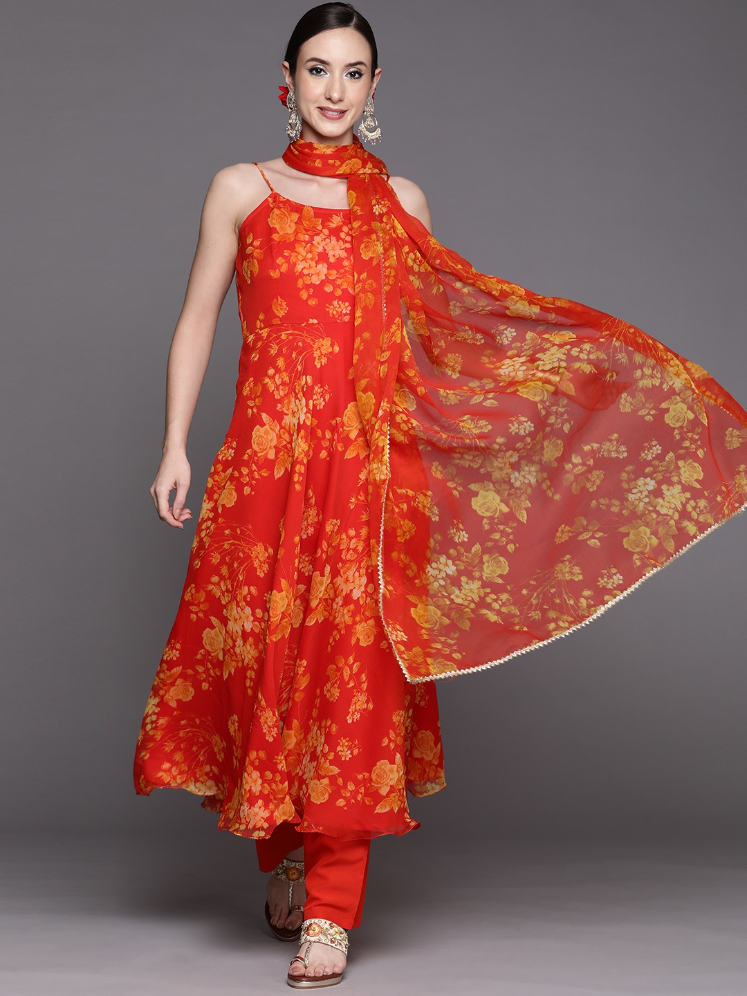

Inddus Women Orange Floral Printed Kurta with Trousers & With Dupatta