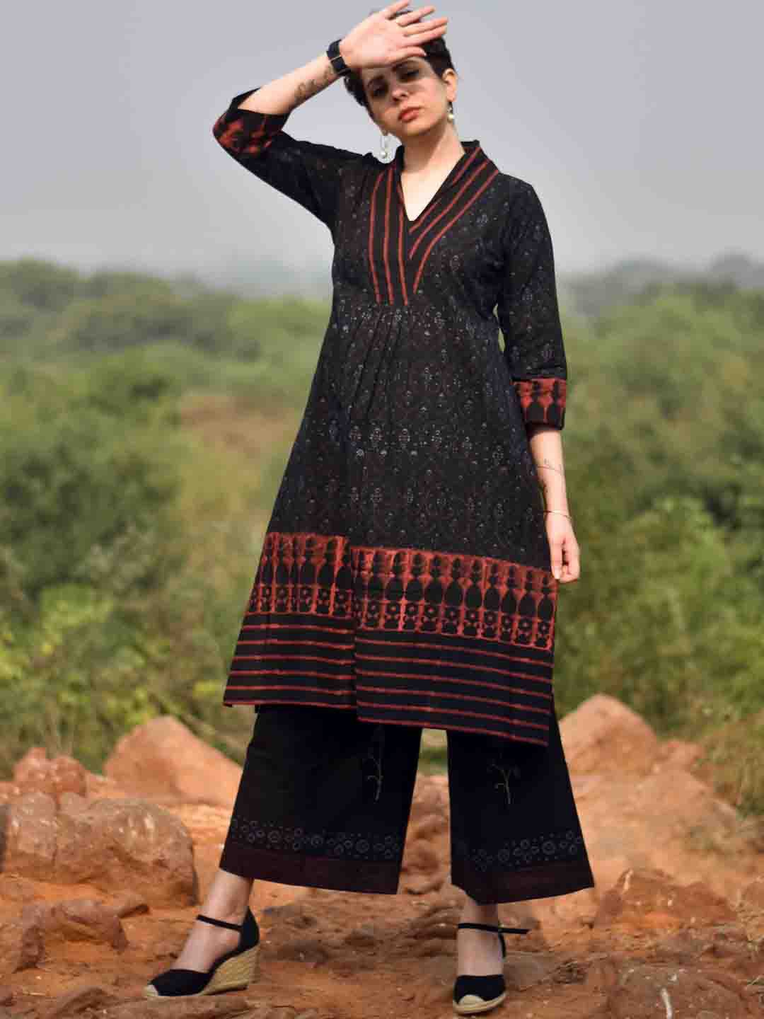 

Chidiyaa Women Red Printed Pleated Pure Cotton Kurta with Trousers