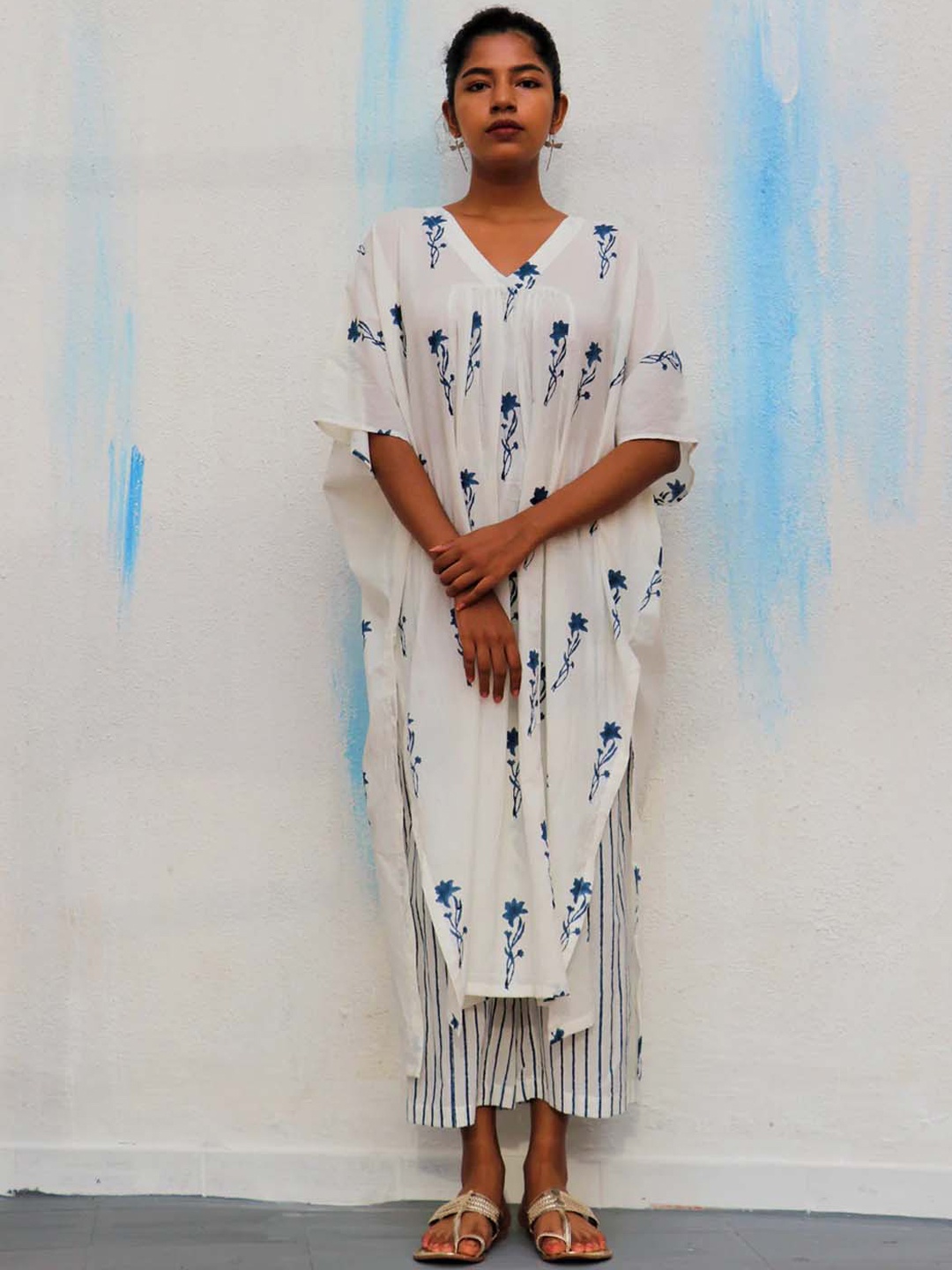 

Chidiyaa Women White Printed Pure Cotton Kafthan Kurta with Palazzos