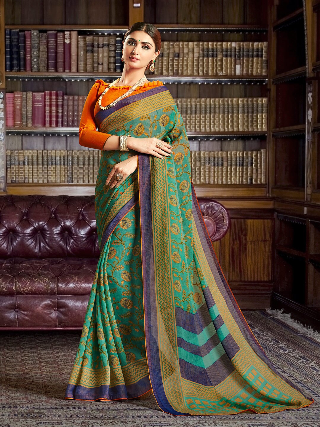 

Shaily Turquoise Blue & Purple Floral Brasso Saree