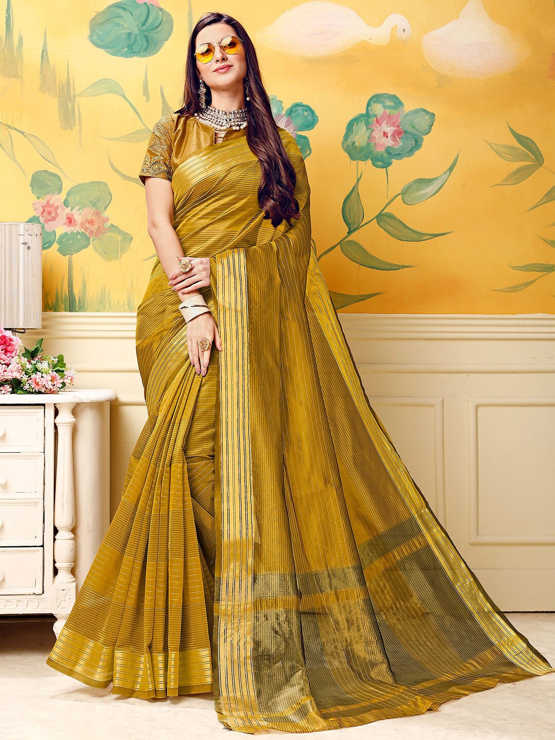 

Shaily Women Mustard & Gold-Toned Striped Zari Silk Blend Saree