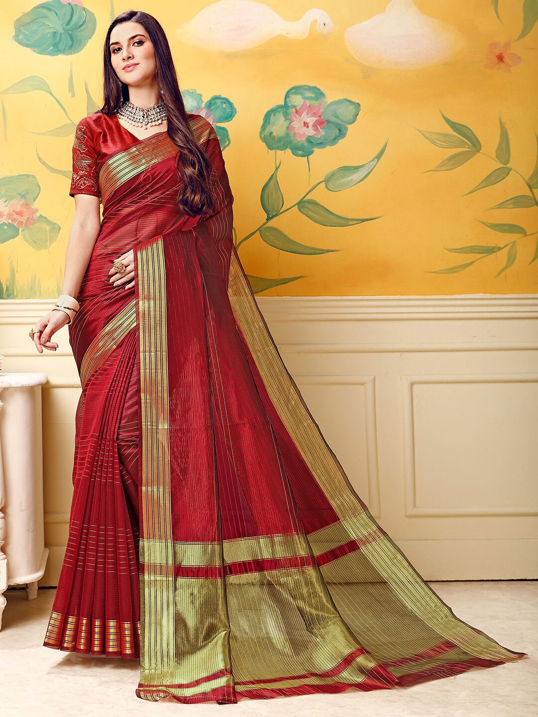 

Shaily Maroon & Gold-Toned Striped Zari Silk Blend Kanjeevaram Saree