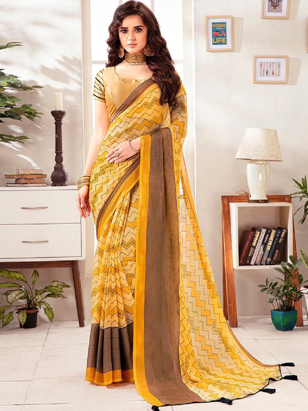 

Shaily Yellow & Beige Chevron Print Poly Georgette Tassel Saree