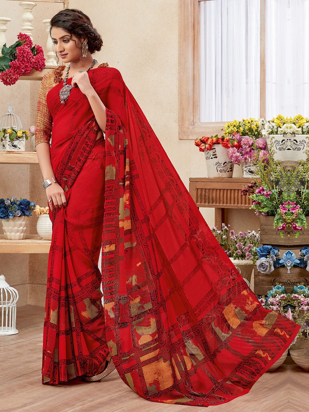 

Shaily Women Red Abstract Printed Poly Georgette Saree