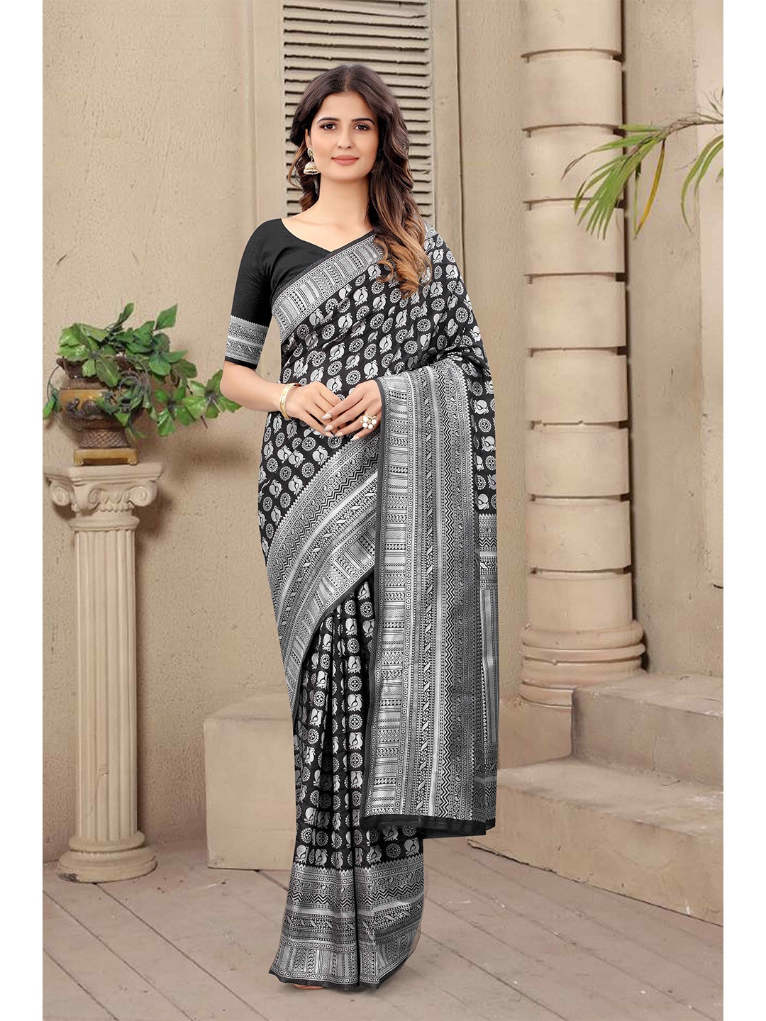 

Mizzific Black & Silver-Toned Woven Design Zari Silk Cotton Banarasi Saree